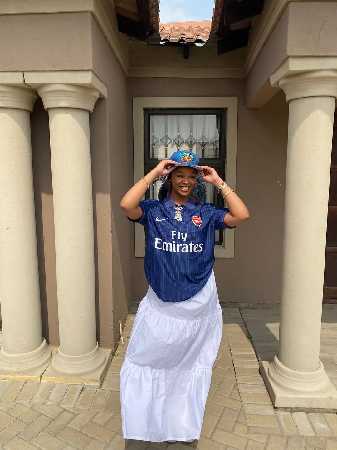 Naledi Mthethwa rocking an Arsenal shirt